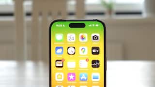 How to reduce background noise for cellular calls on iPhone