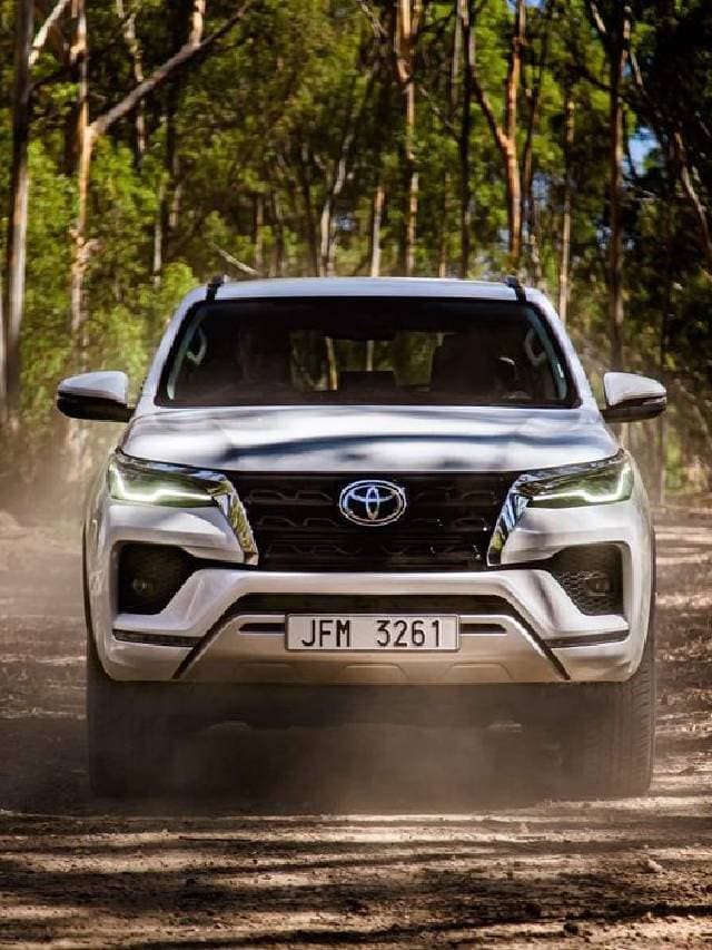 Premium Photo | Fortuner's car is parked on a sandy beach with the waves  crashing in the background Ai generated