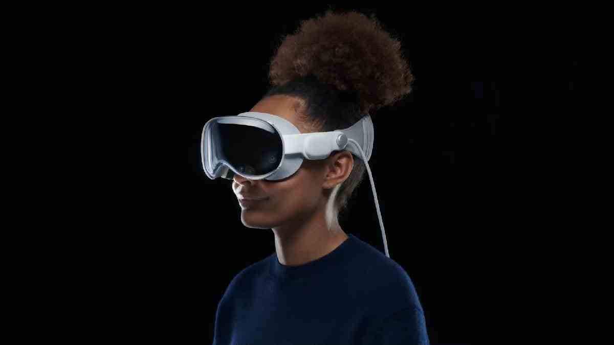 A woman wearing the Apple Vision Pro