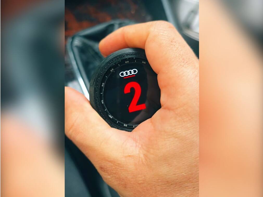 DIY creator turns old smartwatch into functional gear knob display for Audi A4
